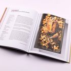 „Freilandgansl mit Quittenkraut und Milchbrotknödeln“ – Ein Rezept mit Zutaten und Zubereitung. Rechts ein Foto einer gebratenen Gans.