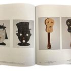 Links: „78“, Text zu Kunstwerken. Rechts: „79“. Vier Masken oder Köpfe in verschiedenen Stilen.