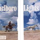 Marlboro Lights, The spirit of Marlboro in a low tar cigarette. Reiter auf Pferd, wolkiger Himmel, weißes Pferd.