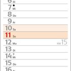 "April 2027". Ein Kalender mit Frühlingsblumen in einem Garten.