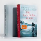 "Die Geschichte in mir" von Rüdiger von Fritsch. Ein Junge fährt Fahrrad auf einem Landweg.