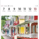 Juni, Kalenderwoche 23: 7. bis 13. Montag bis Sonntag. Oak Bluffs, bunte Häuser, Veranden, Bäume. Massachusetts.