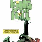 „BIG ASS SWORD“ und „KING OF THE HILL“ in grünen Buchstaben, Roboter mit Schwert in Techno-Landschaft.