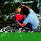 Text: "Mai", "Woche 19", "9 So", "10 Mo", "11 Di", "12 Mi", "13 Do", "14 Fr", "15 Sa". Vater hält Kind am Flussufer.