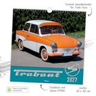 "Technik-Wandkalender für Trabi-Fans. Trabant 2027. Titelblatt mit Glanz-Effekt. Größe: 30 x 30 cm." 

Ein orange-weißer Trabant auf Asphalt.