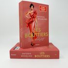 "LES BOUTTIERS" von Antonia Wesseling. "Wir sind jetzt." Illustration einer Frau in rotem Kleid. "Spiegel Bestseller-Autorin."