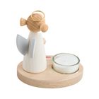 Text "HAB": Ein Holzkorpus-Engel mit goldfarbenem Heiligenschein und grauen Flügeln steht neben einem Teelicht in einem Glas.