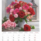 Kalender für September 2027 mit Blumenvase aus roten und rosa Blumen oben und Monatsansicht unten.