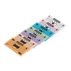 Scheine mit "MONOPOLY" und den Werten 1, 5, 10, 20, 50, 100, 500 in verschiedenen Farben in einer Reihe.