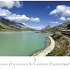 "Lago Bianco" und "CASARES EDITION" stehen unter einem Panoramafoto eines Zuges an einem bergigen See.