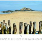 Text: "Fortress Island", "Casares Edition", "5". Ein Strand mit Holzzäunen im Vordergrund und einer Festung im Hintergrund.