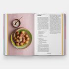 "**Puff Puff**: Nigerian, Ghana, Cameroon. Enthält Rezeptdetails und Zubereitungsmethoden. Links ein Korb mit goldbraunen Teigbällchen."