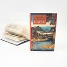 "Das Buch der klassischen Haiku" in orange auf einem Buchcover mit Landschaftsillustration und asiatischen Schriftzeichen.