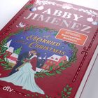 Buchtitel: "A Married Little Christmas". Autor: Abby Jimenez. Sticker: "Spiegel Bestseller-Autorin". Illustration: Hochzeitspaar.