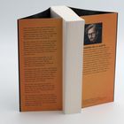 Linker Text: Eine Erzählung über das Finden eines vergrabenen Gesichts. Rechter Text: Autorinfo über Anders de la Motte.