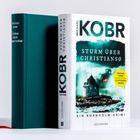 Buchtitel: "Sturm über Christiansø" von Michael Kobr. Cover zeigt stürmische Küste und Turm, Flagge Dänemarks sichtbar.