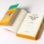 "One Last Night" von Lauren Ford. Ein Buch mit einem Lesezeichen, das eine Strandszene zeigt.