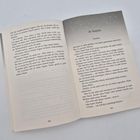 Links: fortlaufender Text, rechts oben: „26. Kapitel Charlotte“. Seitenzahlen 202 und 203. Geöffnetes Buch, heller Hintergrund.