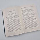 Text: "FEIND IM INNEREN". Offenes Buch mit zwei bedruckten Seiten, Seitenzahlen 146 und 147.