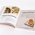 "Herzhafte Schweineöhrchen" und "Panierte Champignons" Rezepte mit Bildern der Gerichte auf einer geöffneten Doppelseite.