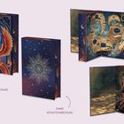 "MIT SCHUTZUMSCHLAG" und "OHNE SCHUTZUMSCHLAG". Cover: Phönix, Karte "AURIALOS", Frau vor mandalaartigem Hintergrund.