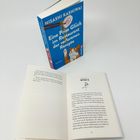 Buchüberschrift: "Eine Prise Glück im Restaurant der verlorenen Rezepte". Geöffnetes Buch mit Kapitel "Gyoza".