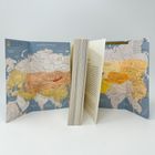 Texte: „NORDPOLARMEER“, „Königreich Temüjin“, „Kaiserreich“, „Bajkal See“. Eine gefaltete Karte zeigt Teile Asiens.