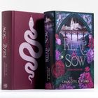 "REAP & SOW, DÄMONENPAKT, Charlotte B. Plumb." Zwei Bücher: eins mit Schlangenmotiv, eins mit Burg und Blumen.