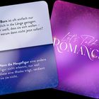 Zwei Karten: Links Text über "Slow Burn" und Masken, rechts ein violettes Design mit "Let's Talk Romance".