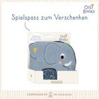"Spielspaß zum Verschenken." Stoffbuch mit süßem Elefanten, Logo "Cosy Books", Verpackung mit Elefantenmotiv.