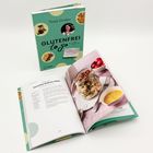 Buchcover „Glutenfrei to go“ von Tanja Gruber. Offenes Buch zeigt Rezept „Würziger Kartoffel-Bohnen-Salat“ mit Foto.