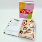 Titel: "Entspannter Bauch - Kompass der Verdauungsprobleme." Rezept: "Kokos-Reis-Creme mit Crunch."