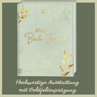 Text: "Mein Buch Journal". Darunter "Hochwertige Ausstattung mit Goldfolienprägung". Hellgrünes, dekoratives Design.