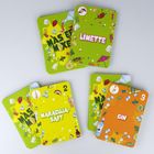 Das Bild zeigt Karten mit den Texten: "LIMETTE", "MARACUJA-SAFT", "GIN". Farben und Cocktail-Symbole sind überall verteilt.
