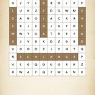 "Lösung: SCHLANGE" in einem Buchstabengitter, einige Buchstaben sind hervorgehoben. Beige Papieroptik im Hintergrund.