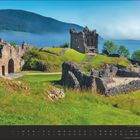 Text: "Mai". Kalenderbild, zeigt Ruinen einer alten Burglandschaft vor einem See und bewaldeten Hügeln.