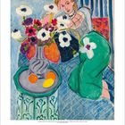 Henri Matisse, Odaliske mit Anemonen, 1937. Illustration einer Frau mit grünem Rock neben einem Tisch mit Blumen und Früchten.