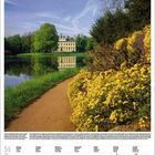Kalenderseite Mai 2027. Ein Weg führt an gelben Blumen entlang. Im Hintergrund ein Gebäude am See.