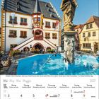 Kalenderseite für Mai 2027, mit Statue auf Brunnen vor einem historischen Gebäude. Montag bis Sonntag aufgelistet.