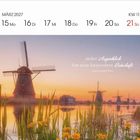 Kalender mit Daten 15.-21. März 2027. Zitat: "Jeder Augenblick hat eine besondere Botschaft." Im Hintergrund Windmühlen.