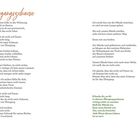 Der Text beschreibt ein "Übergangszuhause" mit Gedanken zu einem provisorischen Leben. Zwei Seiten, links in Orange und rechts in Grün.