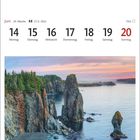 Text: "Juni 14 Montag 15 Dienstag 16 Mittwoch 17 Donnerstag 18 Freitag 19 Samstag 20 Sonntag".

Kalenderdarstellung mit einem Bild der felsigen Küste von Trinity East.