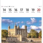 Juni Kalenderwoche: 14-20. Juni. Foto: Historische Steinburg vor blauem Himmel, Bäume im Vordergrund.