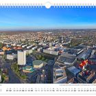 Mai, Luftaufnahme in Richtung Norden. Kalenderdarstellung mit Stadtansicht und Gebäuden im Hintergrund.