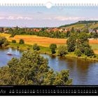 Mai-Kalenderseite mit Elbpanorama, Blick auf Friedenskirche, Fluss, Bäume, Felder; Daten von 1 bis 31 unten angezeigt.
