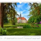 Text: "Schlosspark Reinhardtsgrimma", "Mai", Monatskalender mit Landschaft und Schlossansicht, umgeben von Bäumen und Blumen.