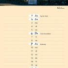 "Mai", "Keitum", "sylt & art". Kalender mit Foto eines Hauses mit Reetdach, Bäumen und grünem Garten.