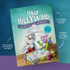"Hase Hollywood" Buchcover mit Hase und Drache, Malutensilien und Farben. Texte zur spielerischen Familienzeit und Bastelbogen.