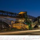 Text: "Werther Brücke", "Wuppertaler Schwebebahn", Kalender Mai 2027. Abendszene mit beleuchteter Schwebebahnstation.
