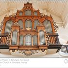 Kalenderseite mit einer Orgel in der Kirche Saint-Martin, Kintzheim, Frankreich. Dekorativ geschnitzte Holzstruktur.